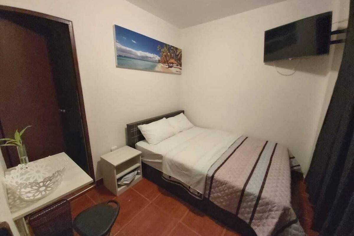 Laptop workspace, free WiFi, bed sheets