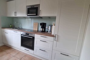 Refrigerador, microondas, horno y lavavajillas