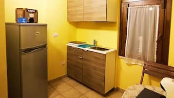 Fridge, microwave, electric kettle, high chair