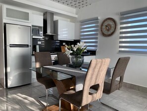 Microwave, coffee/tea maker, cookware/dishes/utensils