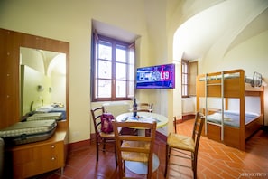 Standard Triple Room | Desk, laptop workspace, iron/ironing board, free WiFi