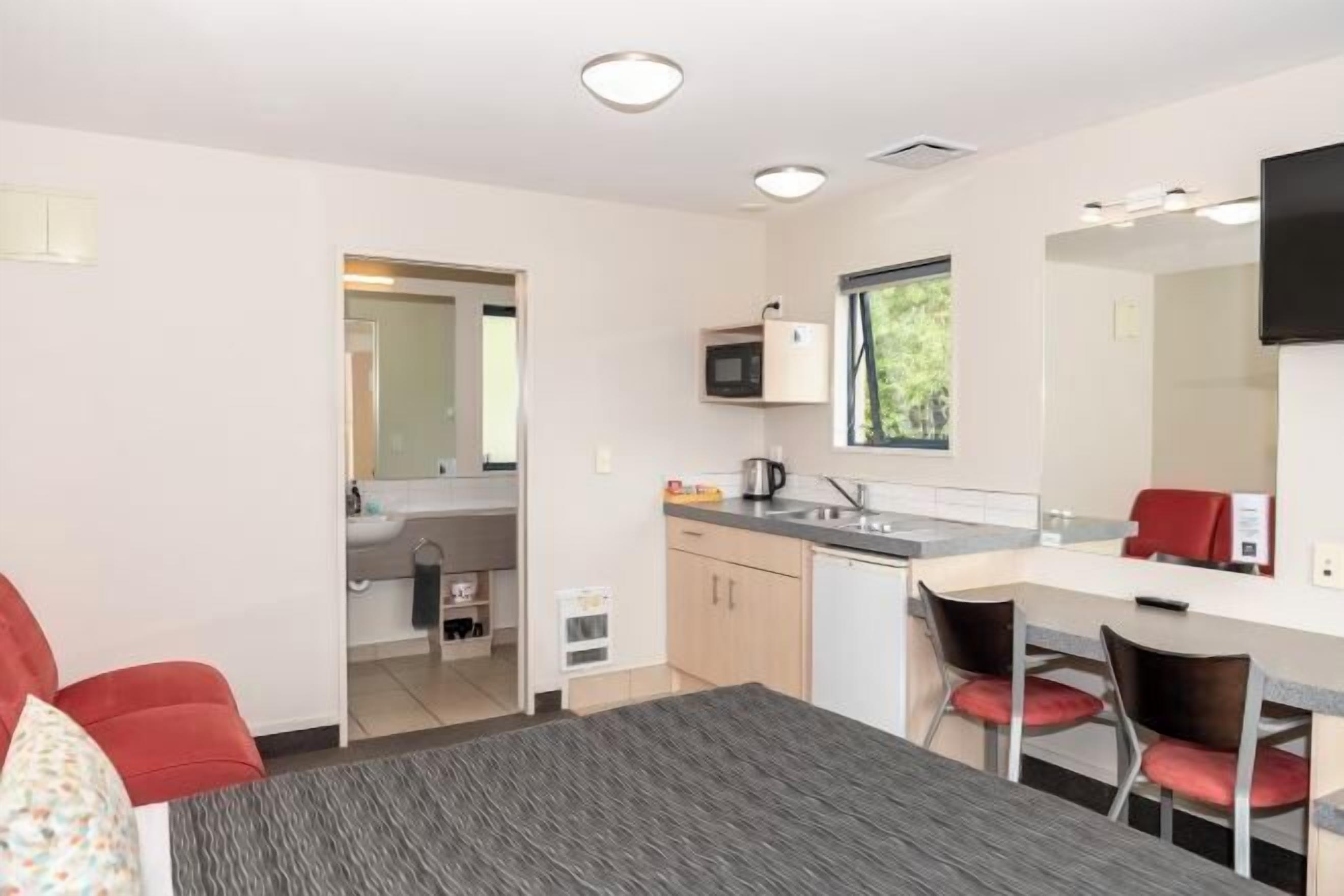 Desk, blackout drapes, soundproofing, iron/ironing board