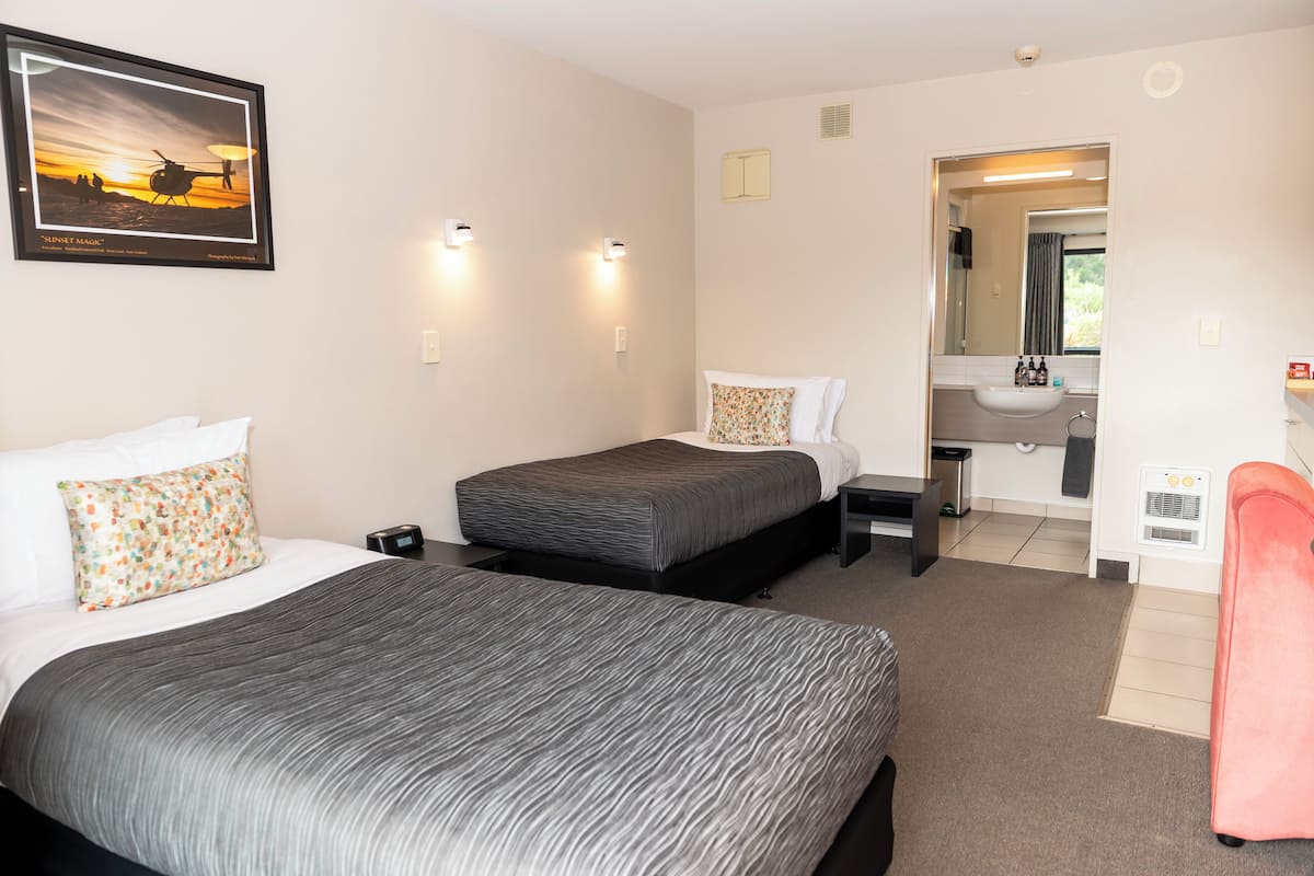 Twin Studio | Desk, blackout curtains, soundproofing, iron/ironing board