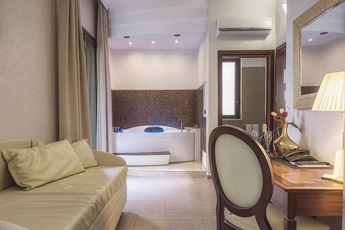 Junior Suite, Jetted Tub | 1 bedroom, premium bedding, down comforters, minibar