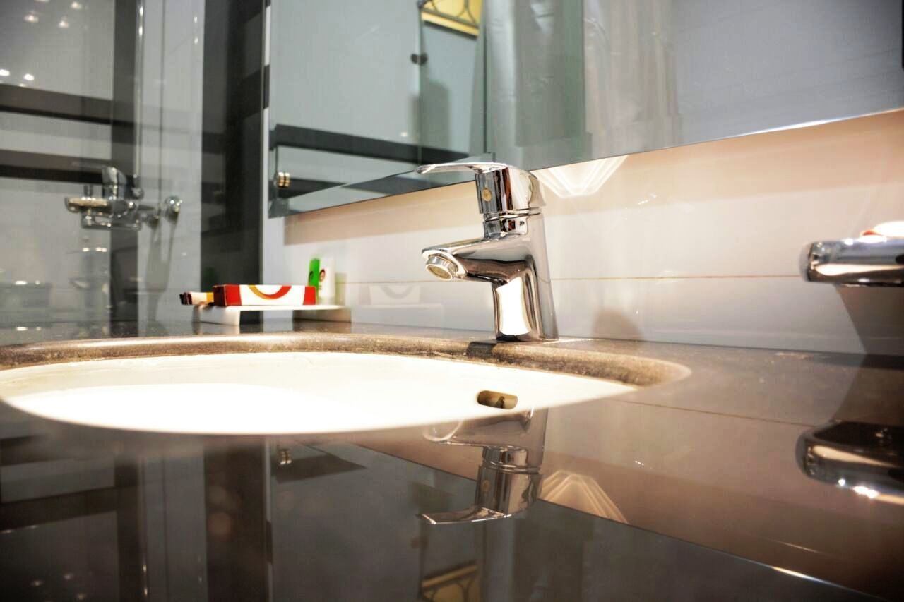 shower, free toiletries, slippers, towels