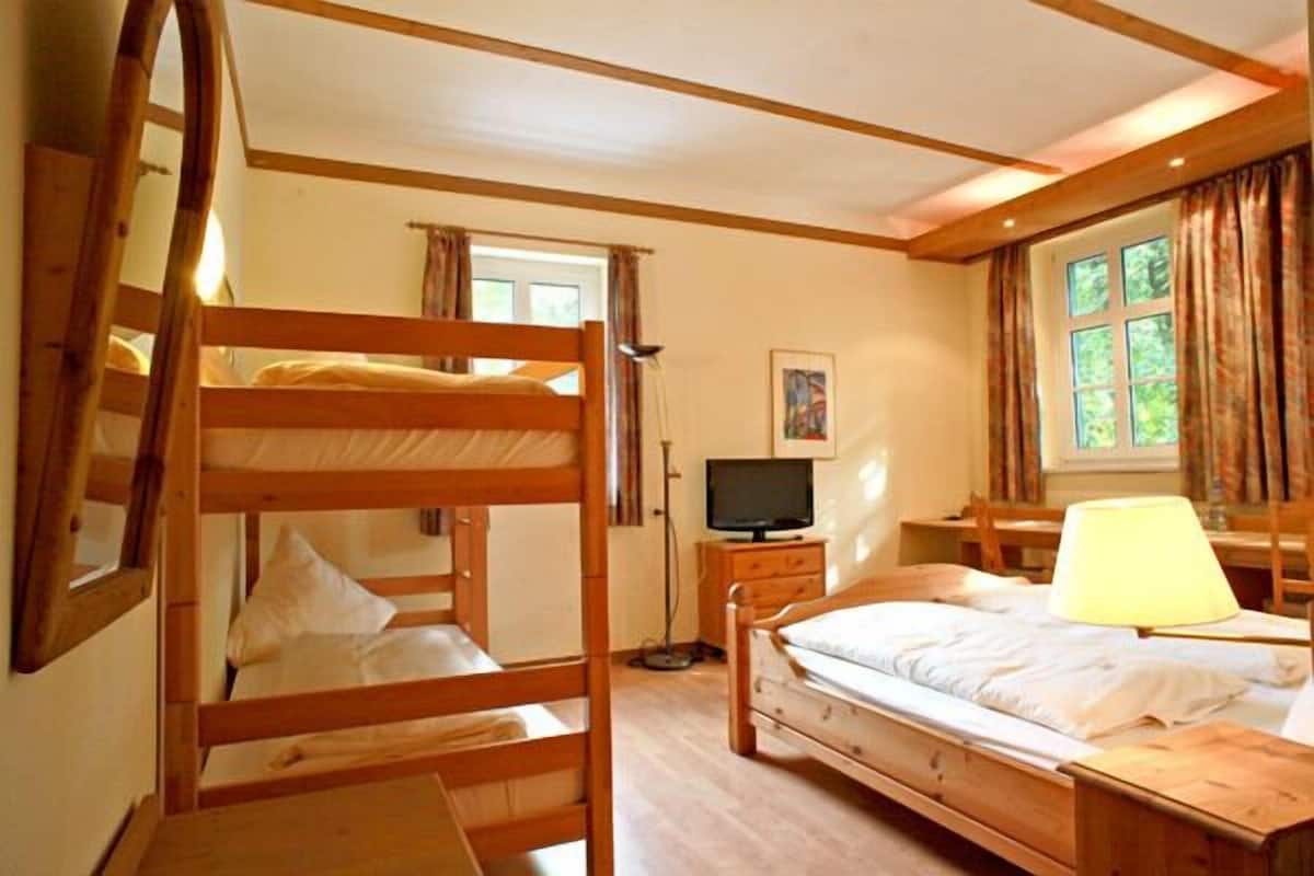 hypo-allergenic bedding, desk, iron/ironing board, free cots/infant beds