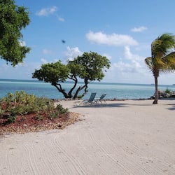 Private beach, sun loungers, beach towels, kayaking