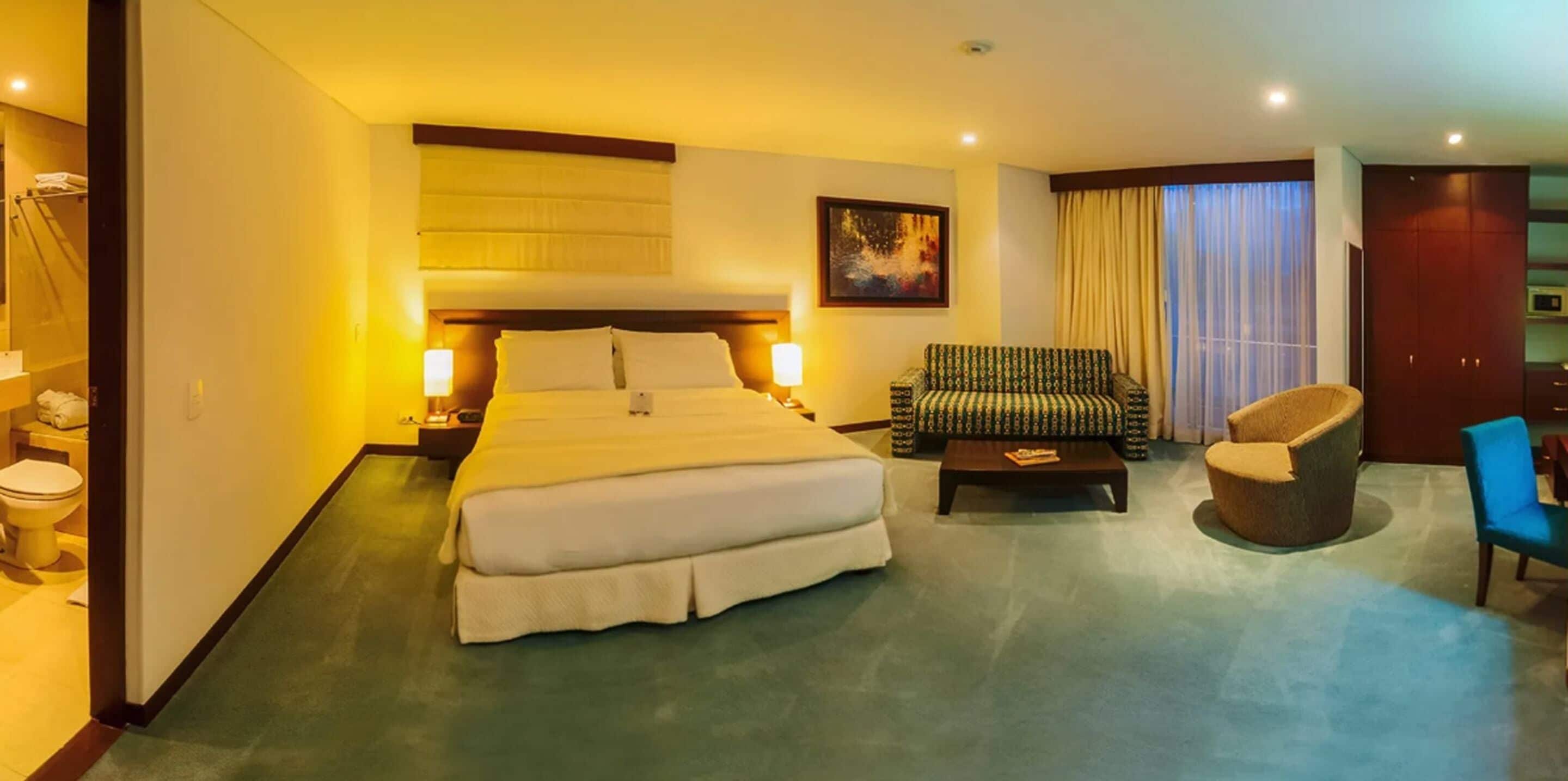 executive double room | premium bedding, minibar, in-room safe, desk