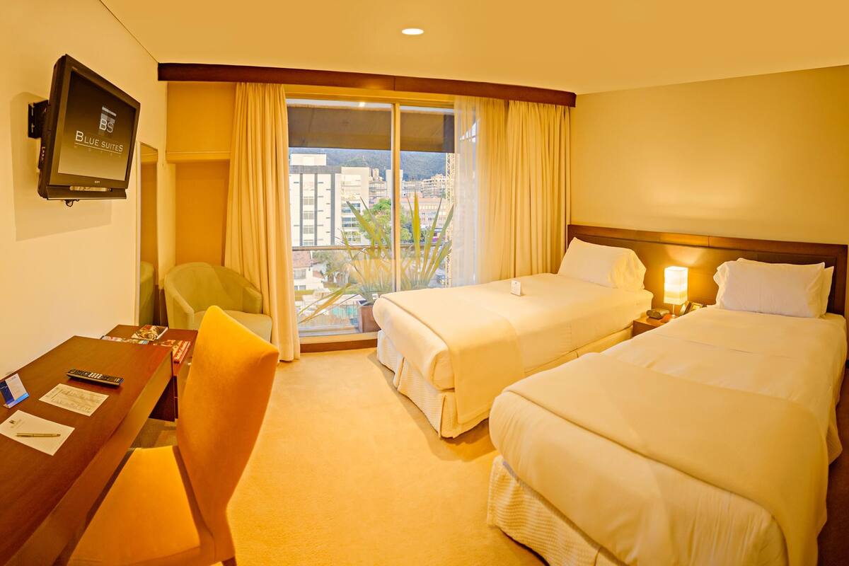 Ropa de cama de alta calidad y minibar 