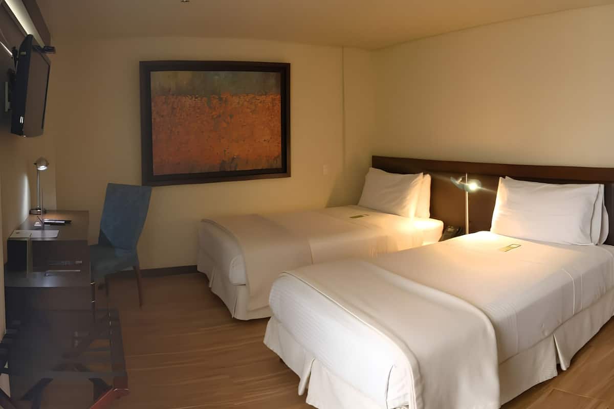 Ropa de cama de alta calidad y minibar 
