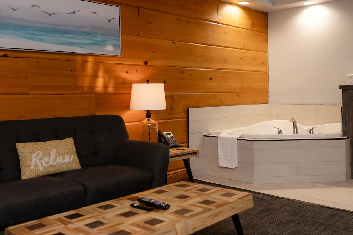 Luxury Suite, 1 King Bed, Jetted Tub, Lake View | Living area | 42-inch LCD TV with premium channels, TV