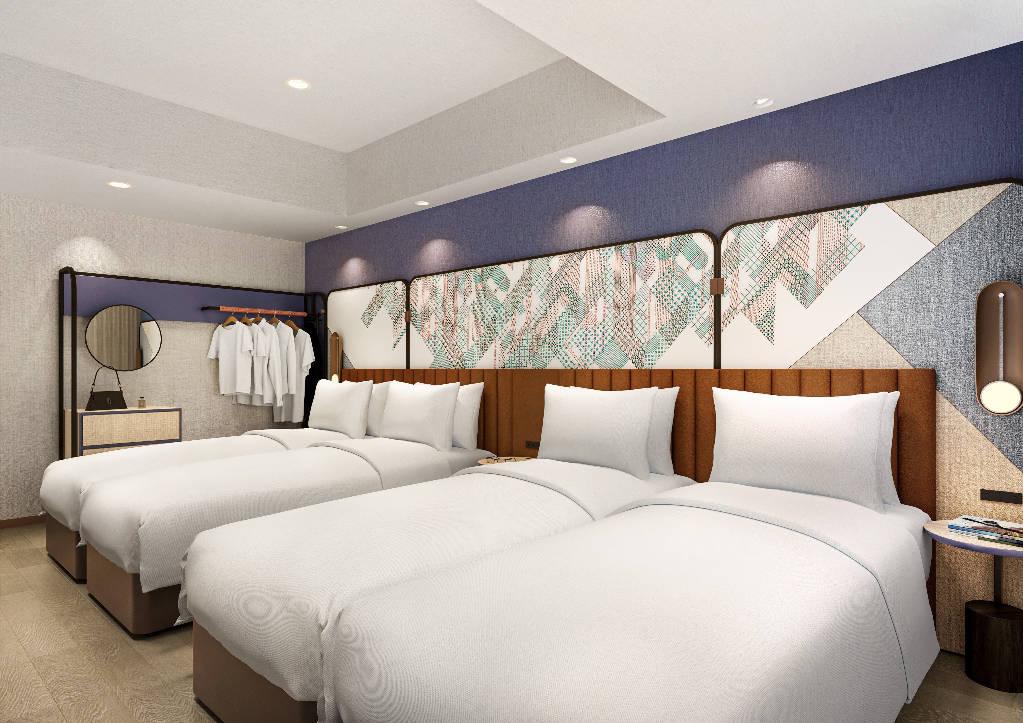 A hotel room with two beds, a mirror, a dresser, and a wall with a geometric pattern.