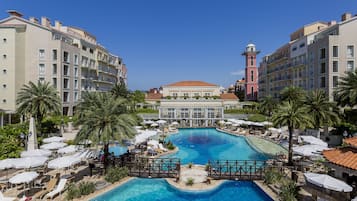 Indoor pool, pool umbrellas, pool loungers