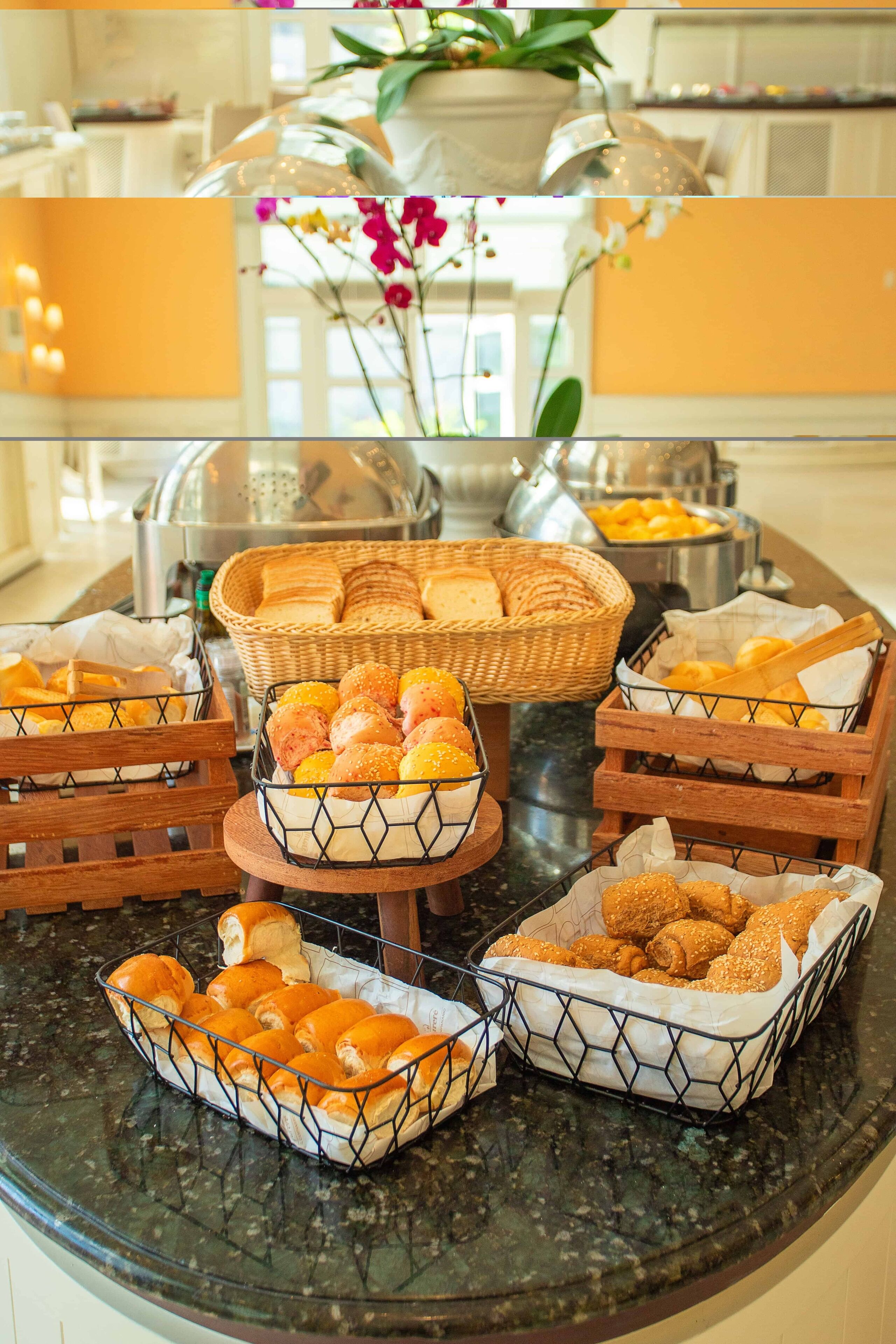 A buffet with various baked goods and pastries.