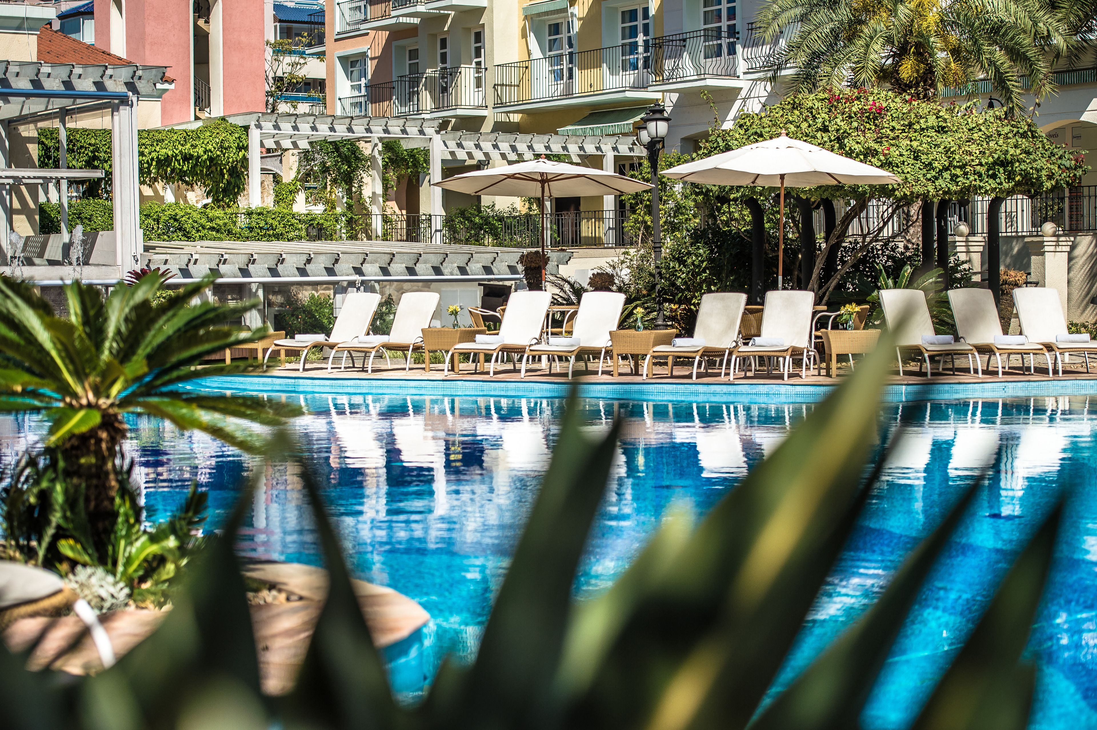 indoor pool, 2 outdoor pools, pool umbrellas, pool loungers