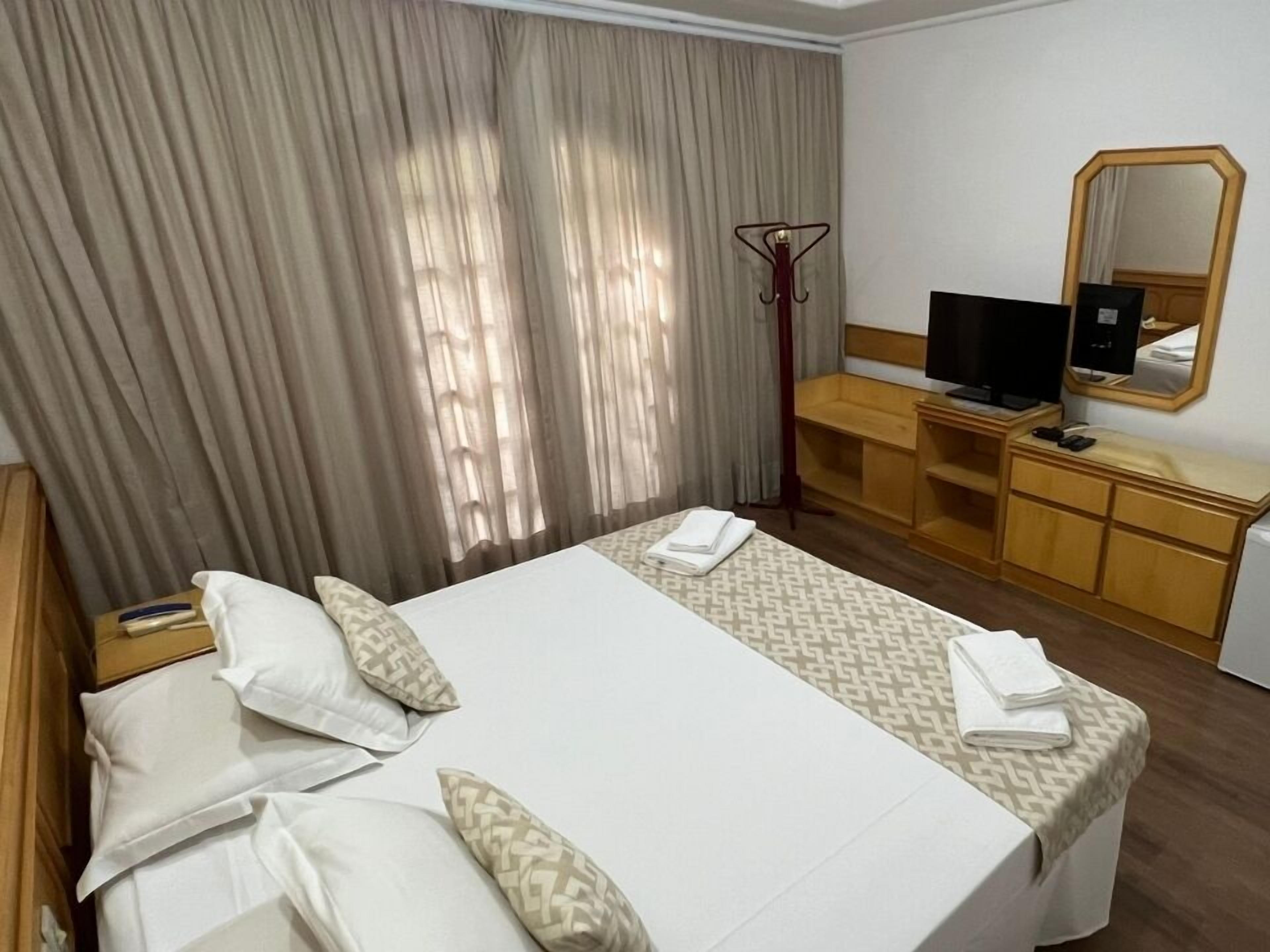 Suíte luxo | Frigobar, cofres nos quartos, Wi-Fi de cortesia, roupa de cama