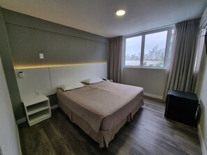 Standard Room, Sea View | Minibar, in-room safe, desk, laptop workspace