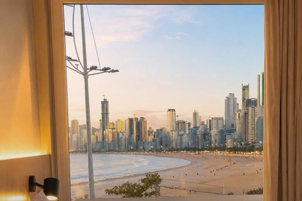Superior Room, Sea View | Minibar, in-room safe, desk, laptop workspace