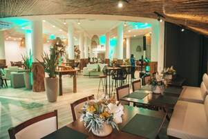 Breakfast, lunch, dinner served; beach views