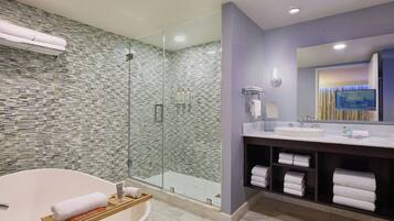 Combined shower/tub, designer toiletries, hair dryer, towels