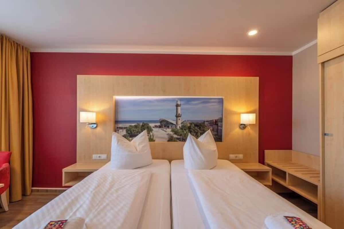 Hypo-allergenic bedding, in-room safe, desk, laptop workspace