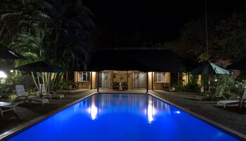 Outdoor pool, pool umbrellas, sun loungers