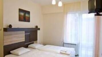 Double Room | Pillow-top beds, minibar, desk, iron/ironing board