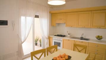 Family Duplex, 3 Bedrooms, Bathtub | Living area | 32-inch LED TV with digital channels, TV