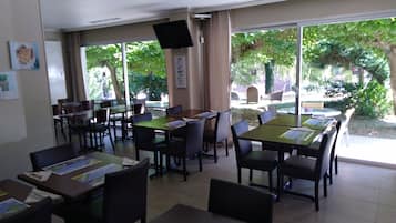 Daily buffet breakfast (EUR 18 per person)