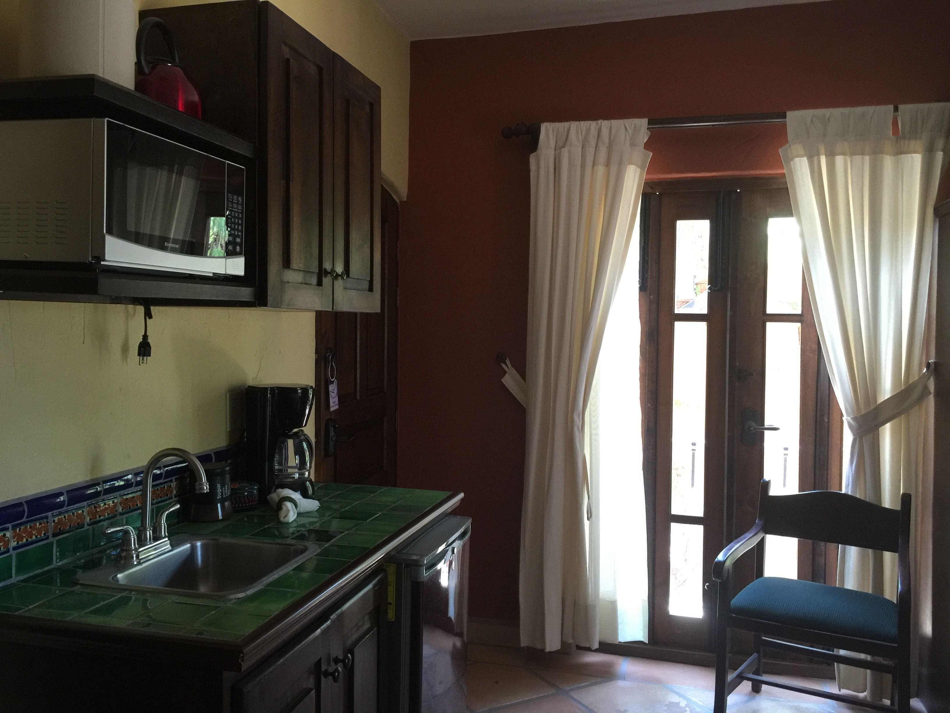 suite king bed, balcony, terrace, kitchenette, upperfloor | private kitchen | coffee/tea maker, electric kettle