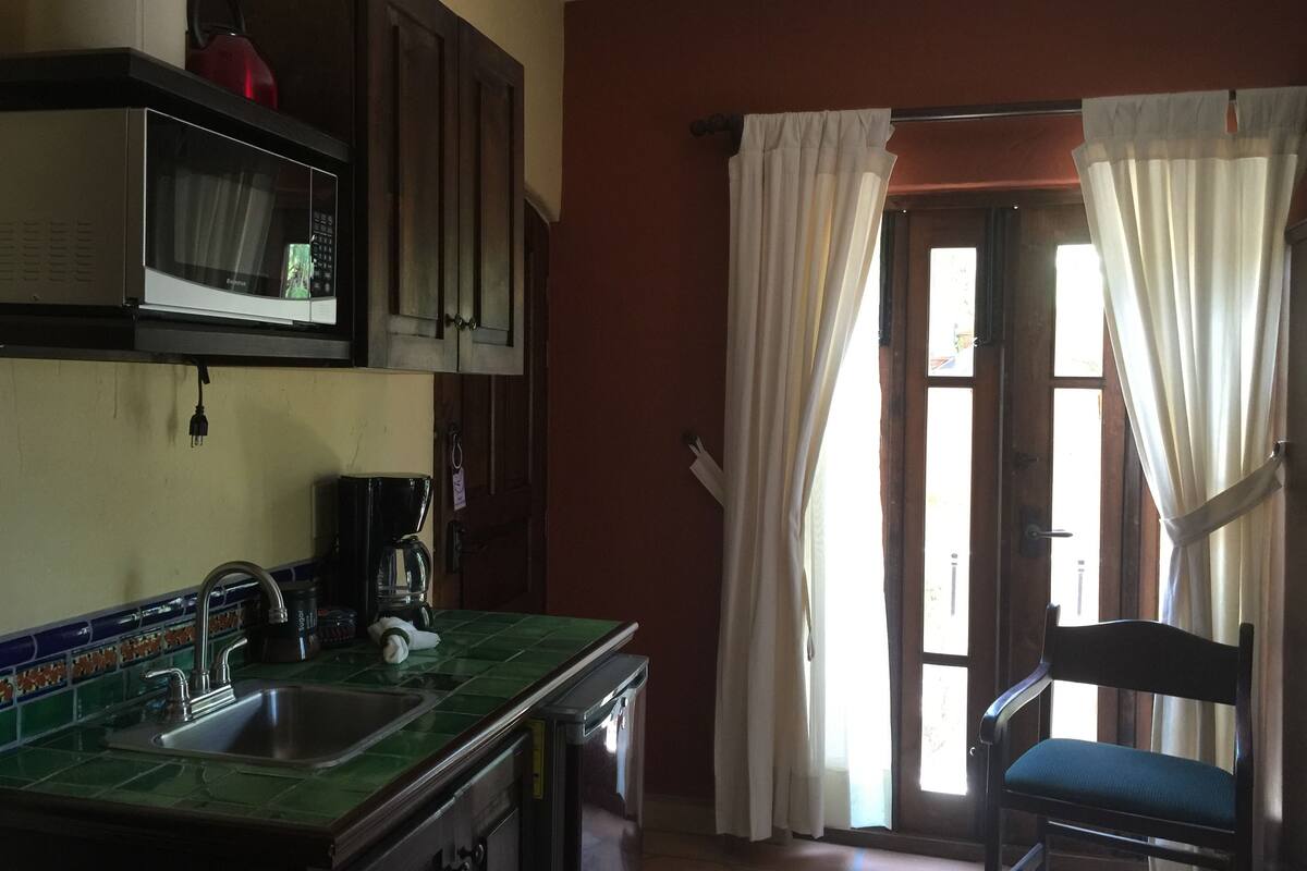 suite king bed, balcony, terrace, kitchenette, upperfloor | private kitchen | coffee/tea maker, electric kettle