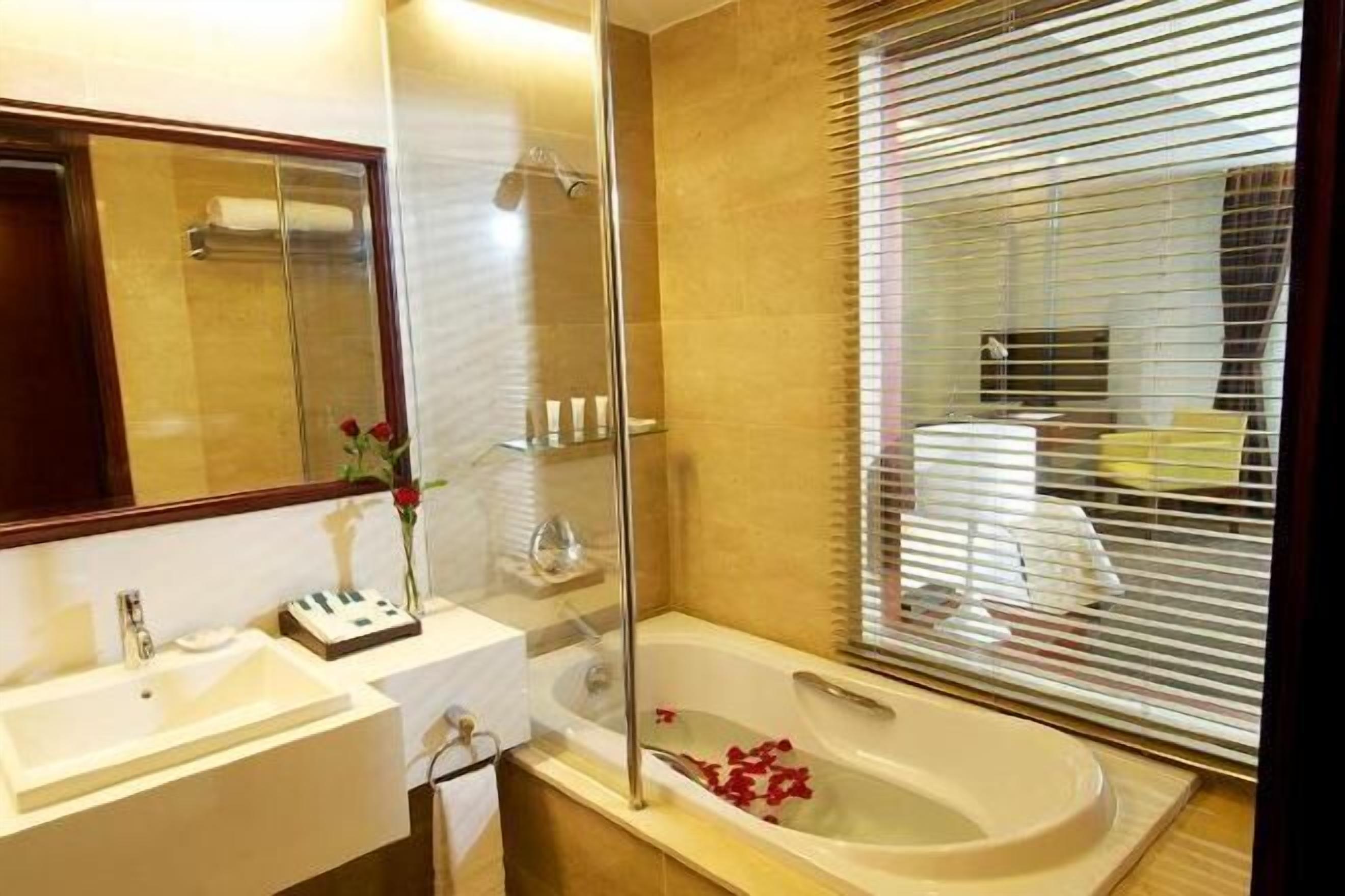 Bathroom | Shower, free toiletries, hair dryer, slippers