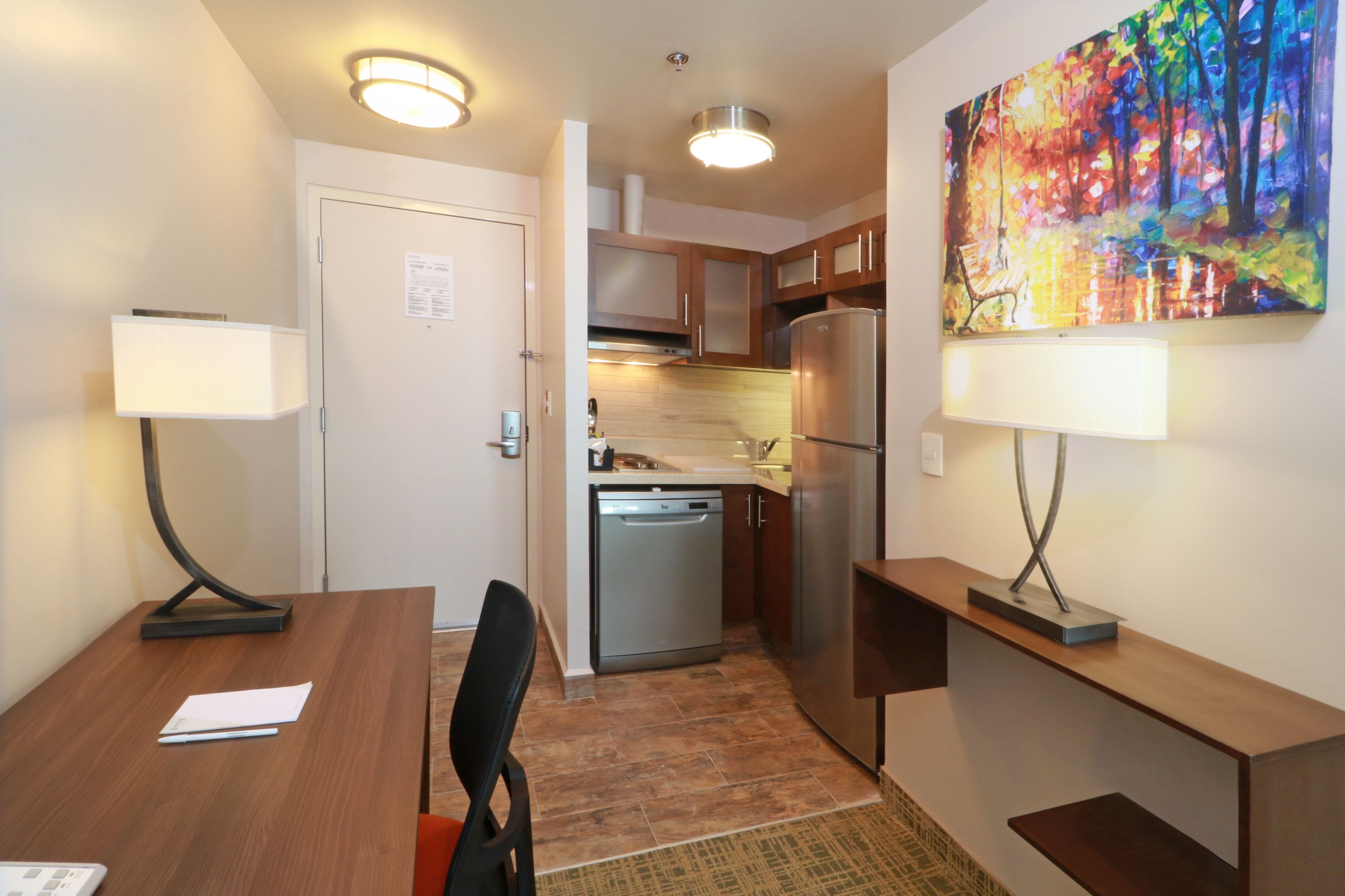 full-sized fridge, microwave, stovetop, dishwasher