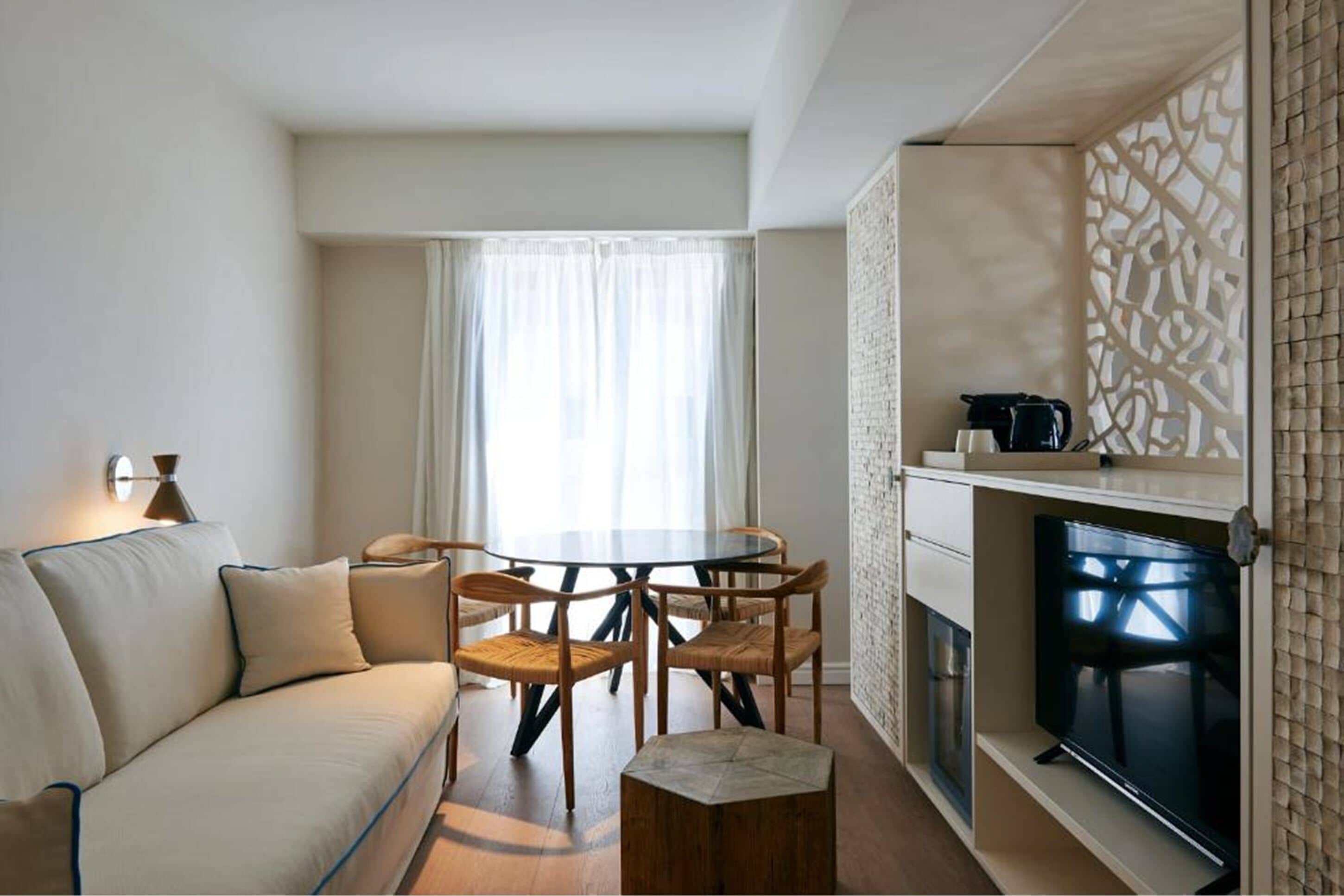 Family Room, Sea View | In-room safe, desk, soundproofing, iron/ironing board