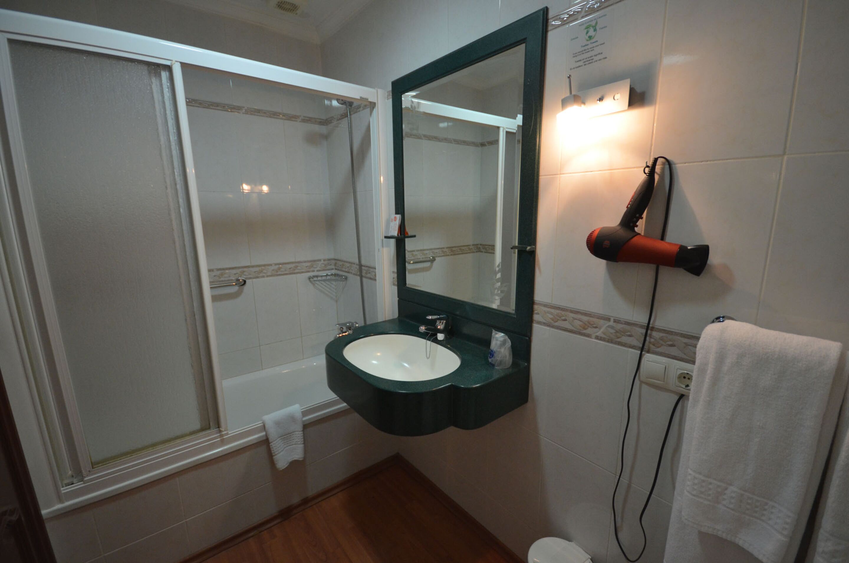 hair dryer, bidet, towels