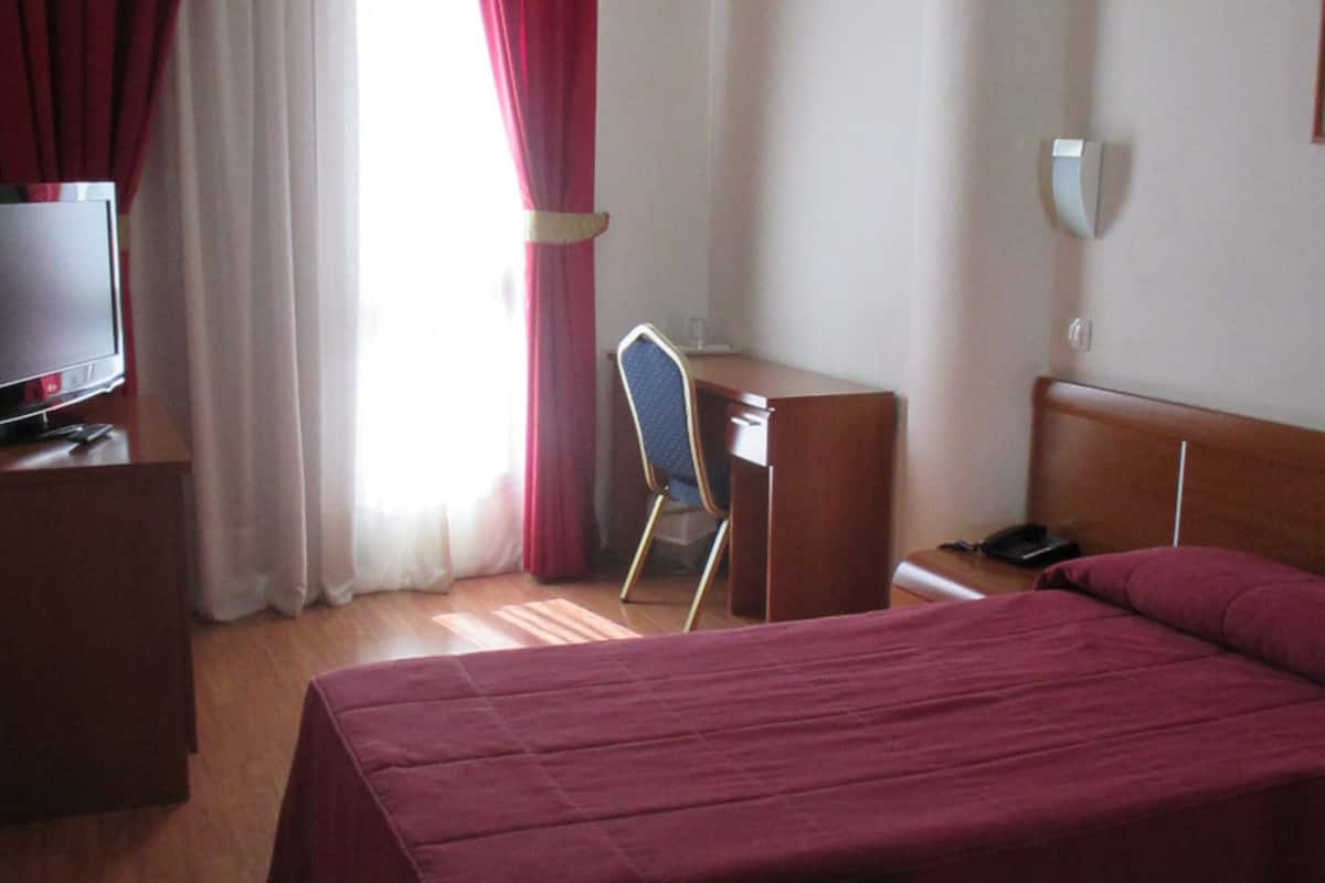 single room | in-room safe, desk, blackout curtains, free cots/infant beds