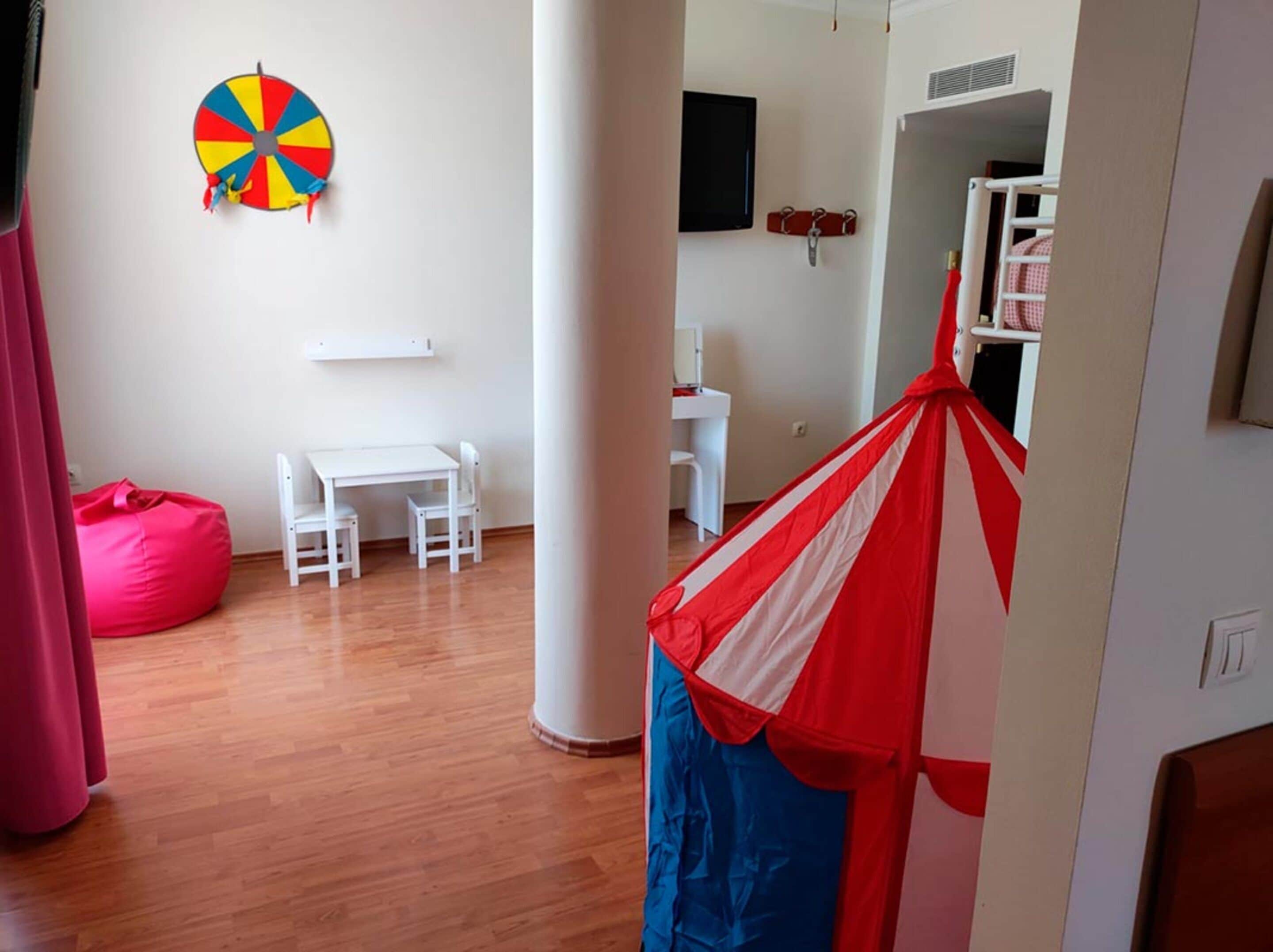 family room | in-room safe, desk, blackout curtains, free cots/infant beds