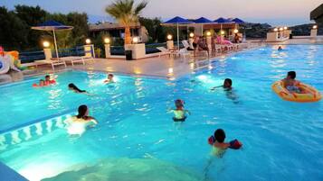 Outdoor pool, pool umbrellas, pool loungers