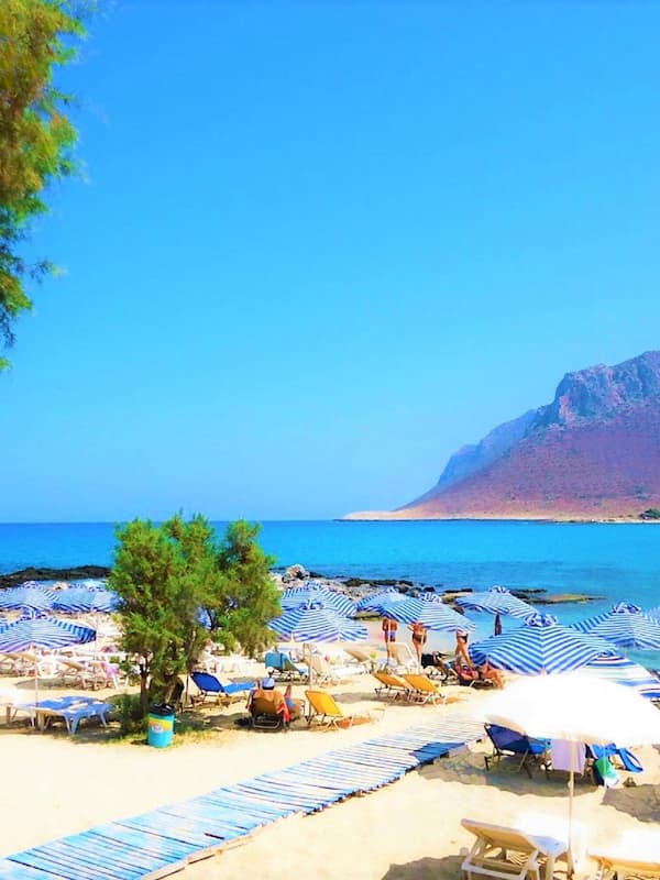 Private beach, white sand, sun-loungers, beach umbrellas