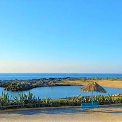 Private beach, white sand, sun-loungers, beach umbrellas
