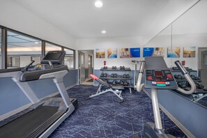 A gym with treadmills, dumbbells, and exercise equipment. - Comfort Inn Goshen (Goshen)