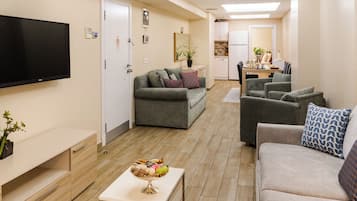 Apartment, 3 Bedrooms, Garden Area | Premium bedding, in-room safe, desk, laptop workspace