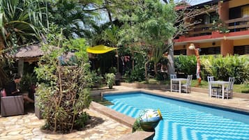 Outdoor pool, pool umbrellas, pool loungers
