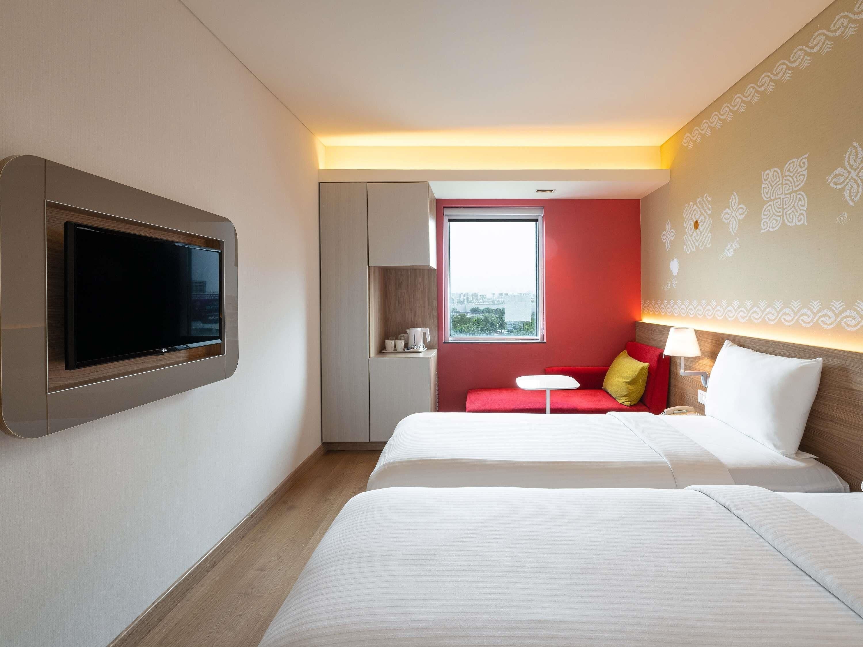 Chambre Standard avec lits jumeaux | Coffres-forts dans les chambres, bureau, rideaux occultants