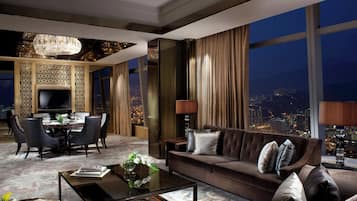Club Suite, 1 Bedroom | Living room | 42-inch LCD TV with cable channels, TV, DVD player