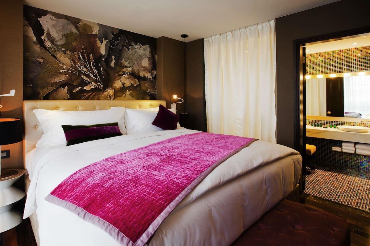 Suite, 1 King Bed | Minibar, in-room safe, desk, blackout curtains