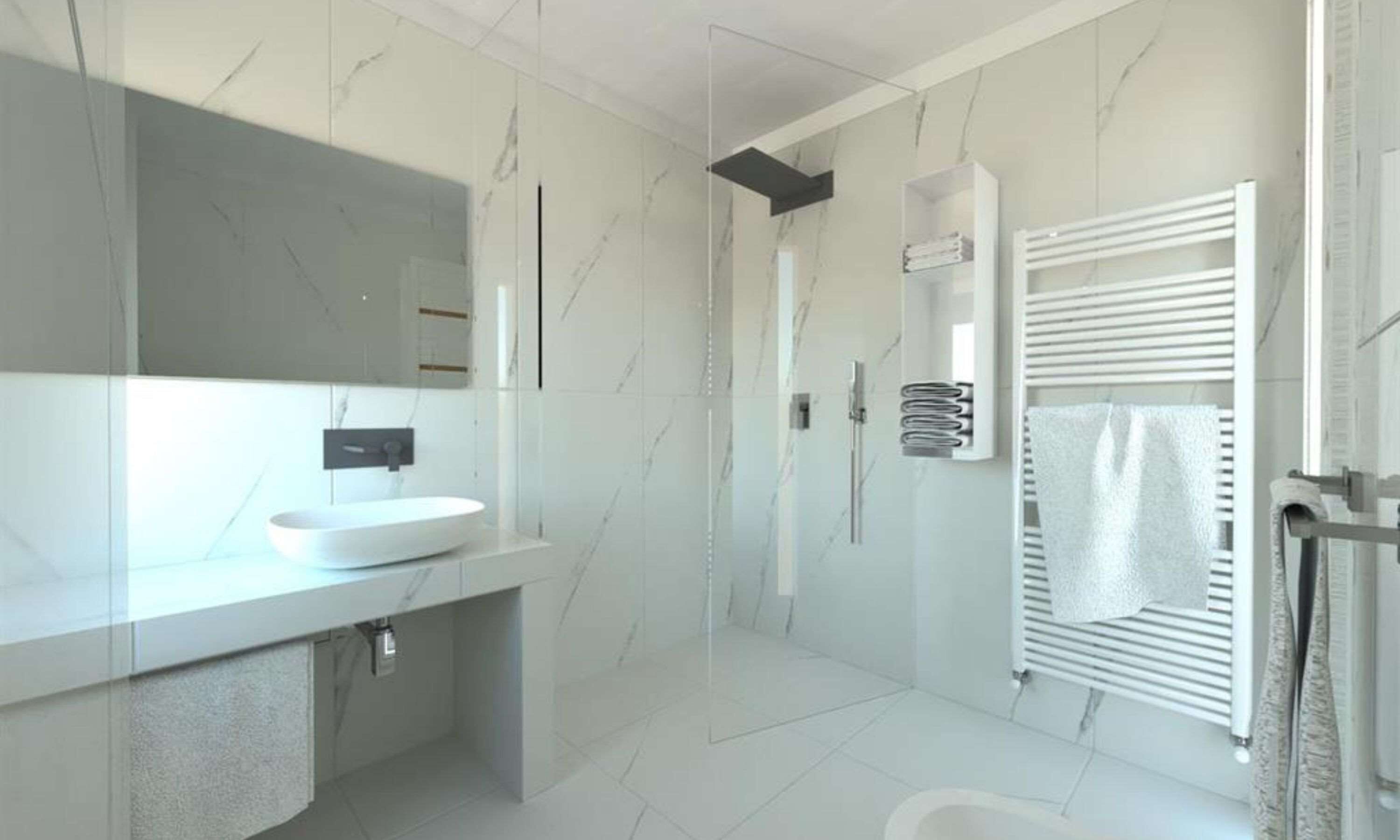 Une salle de bain moderne avec un lavabo blanc, une cabine de douche en verre et un porte-serviettes.