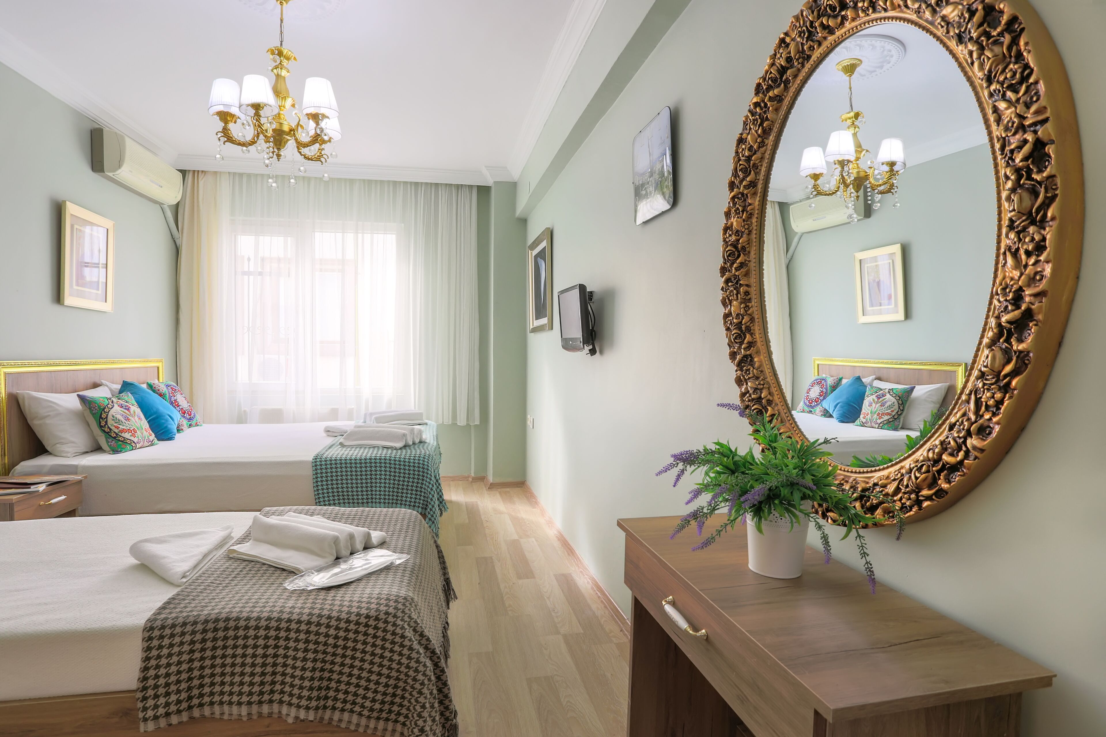 Standard Triple Room, Multiple Beds, Partial Sea View | Room amenity