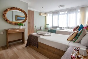 Deluxe Triple Room | Lakens van Egyptisch katoen, luxe beddengoed, pillowtop-bedden