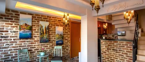 35-inch LCD TV with satellite channels, TV, books